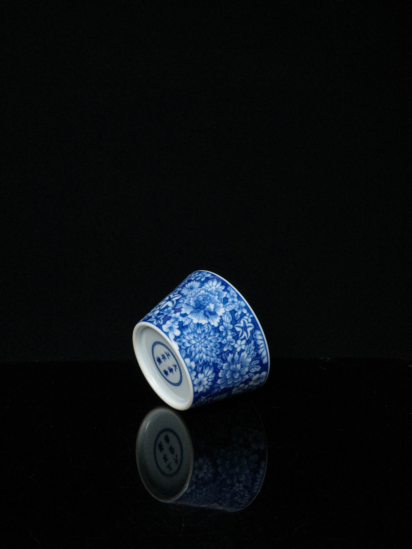 Kilnora Blue-and-White Myriad Flowers porcelain coffee cup featuring intricate floral pattern