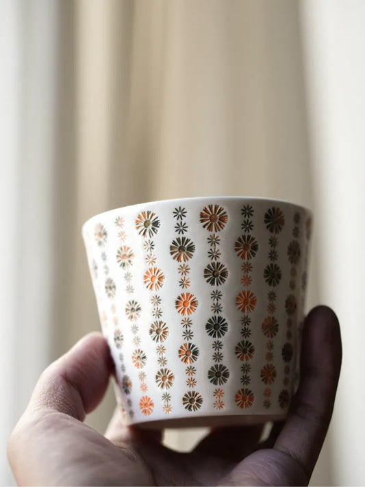 Kilnora LOOFA STUDIO Apricot Hue carved daisy porcelain cup with gentle apricot glaze