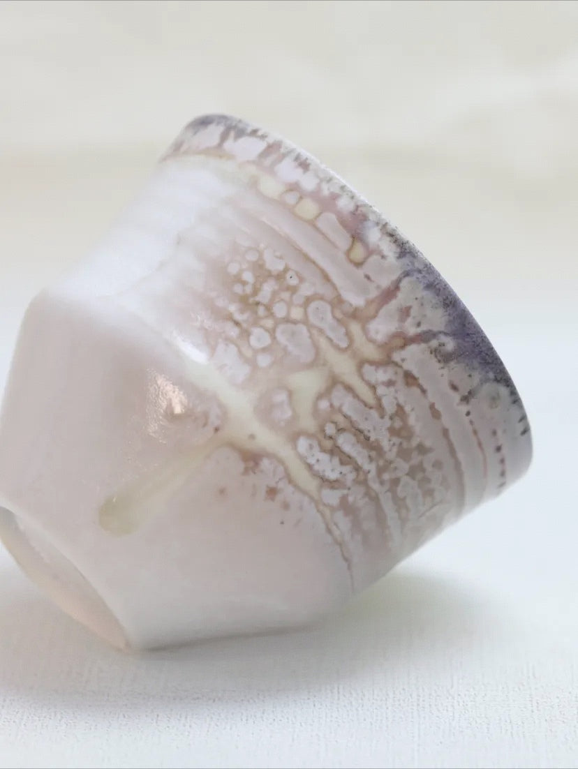 Kilnora Chihiro Series wood-fired porcelain cup with gentle curves and flame-kissed finish.