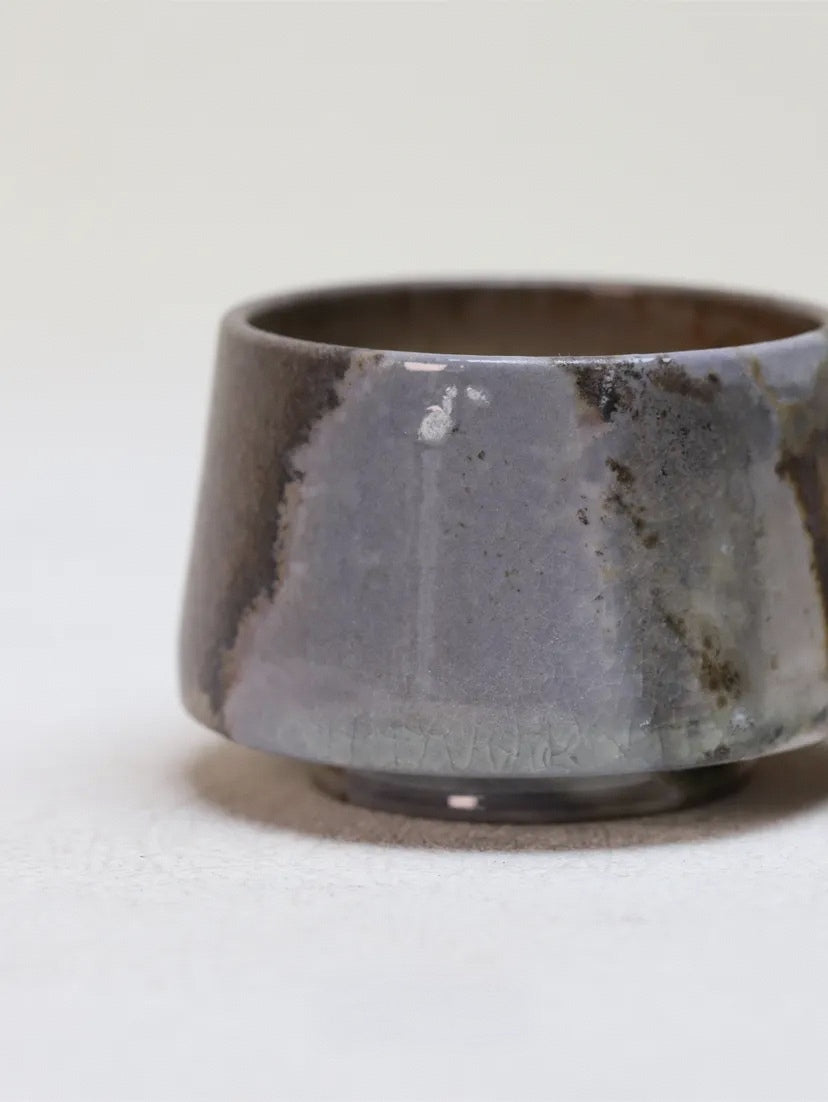 Kilnora Chihiro Series charcoal bare cup wood-fired for deep graphite tones and raw texture.