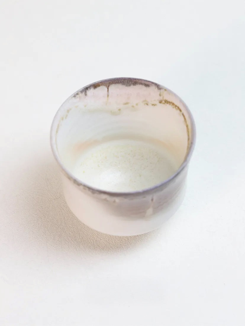 Kilnora Chihiro Series wood-fired porcelain cup with gentle curves and flame-kissed finish.