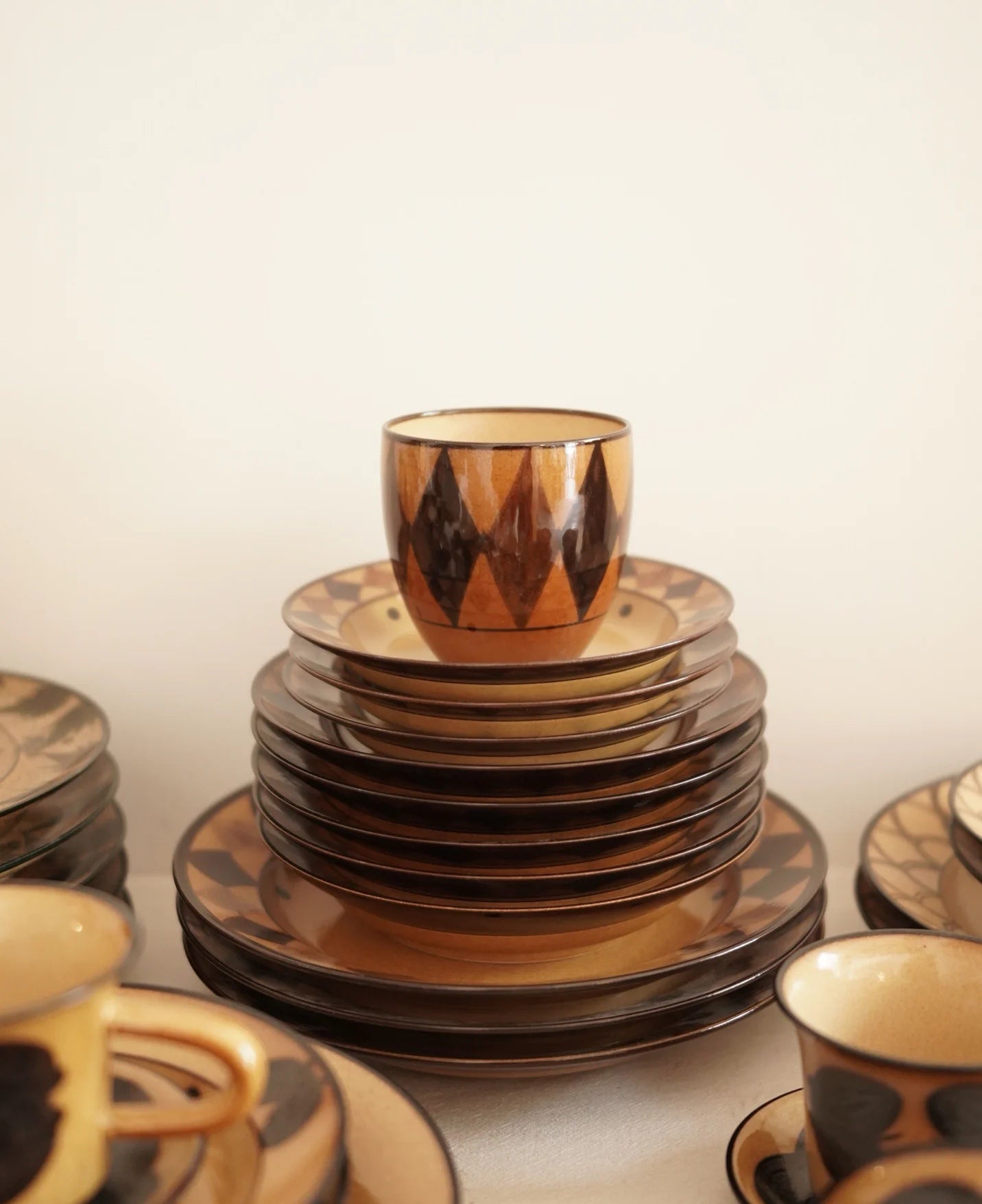 Kilnora Shisō diamond-shaped porcelain cup with geometric underglaze motifs