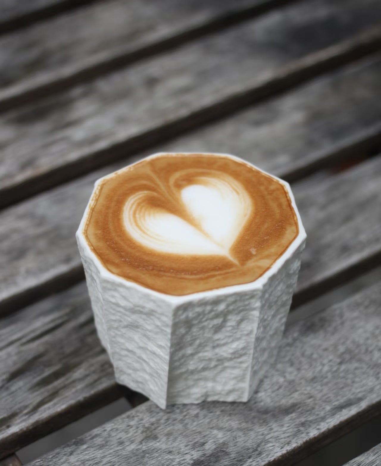 Kilnora Lumora Sekisen Series 180 ml porcelain cup with folded stone-inspired form and translucent paper-thin walls.