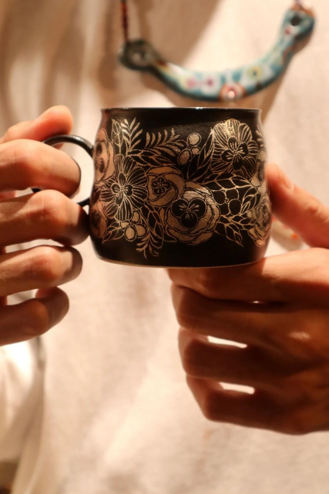 Kilnora Aokawa Chihiro Camellia porcelain cup with silver inlay camellia motif