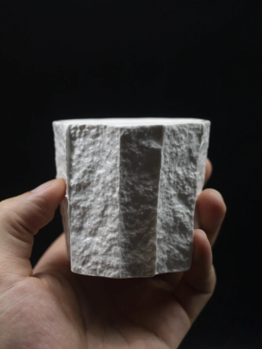 Kilnora Lumora Sekisen Series 180 ml porcelain cup with folded stone-inspired form and translucent paper-thin walls.