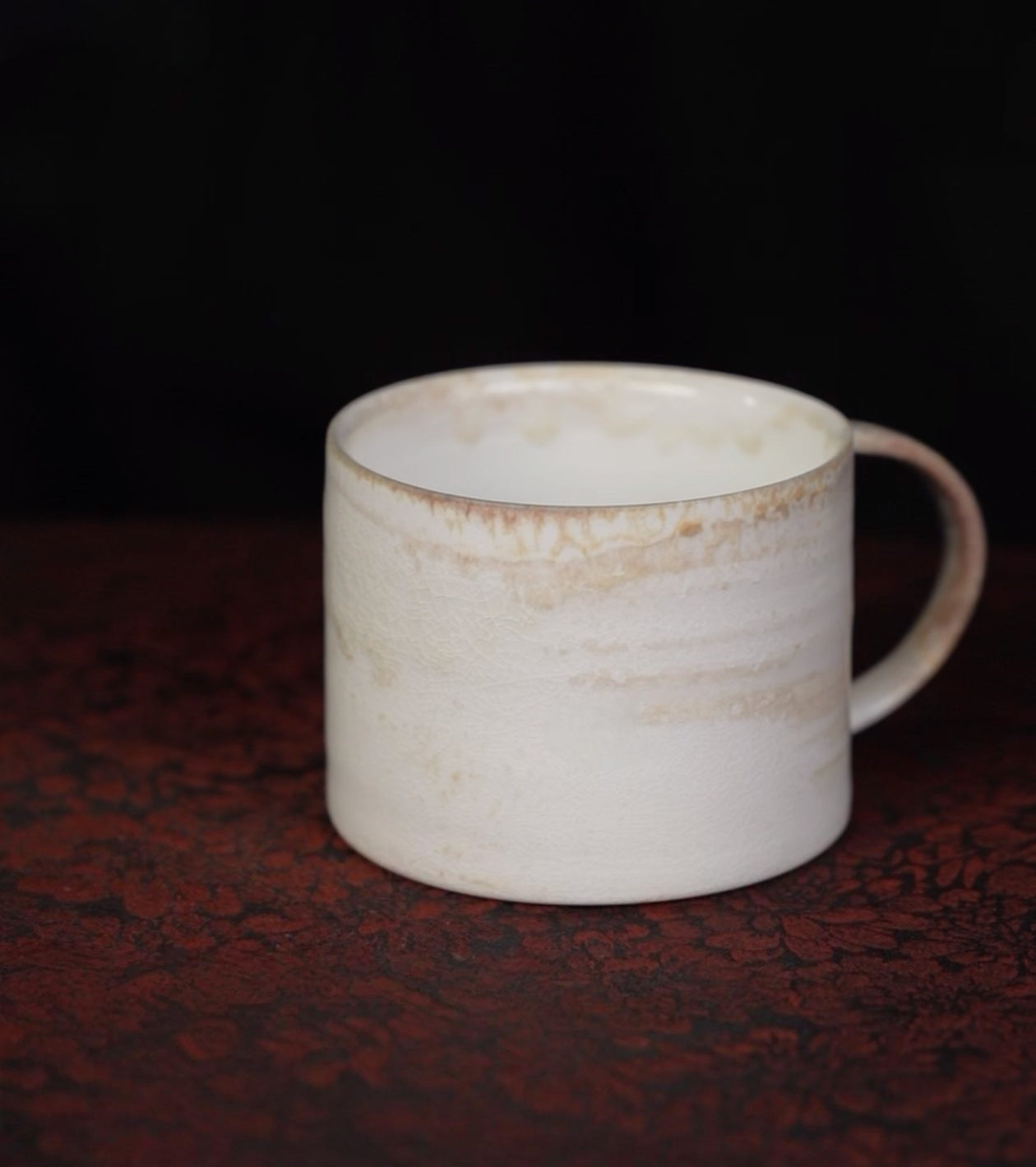 Kilnora Dai-in Series high-white clay wood-fired mug showcasing pure porcelain translucence.