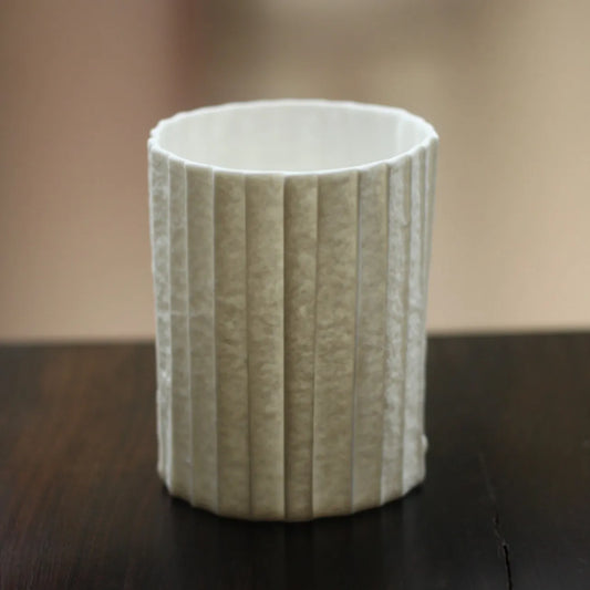 Kilnora Lumora Stonefold Series 200 ml porcelain cup featuring handcrafted rock-fold textures and soft translucence.