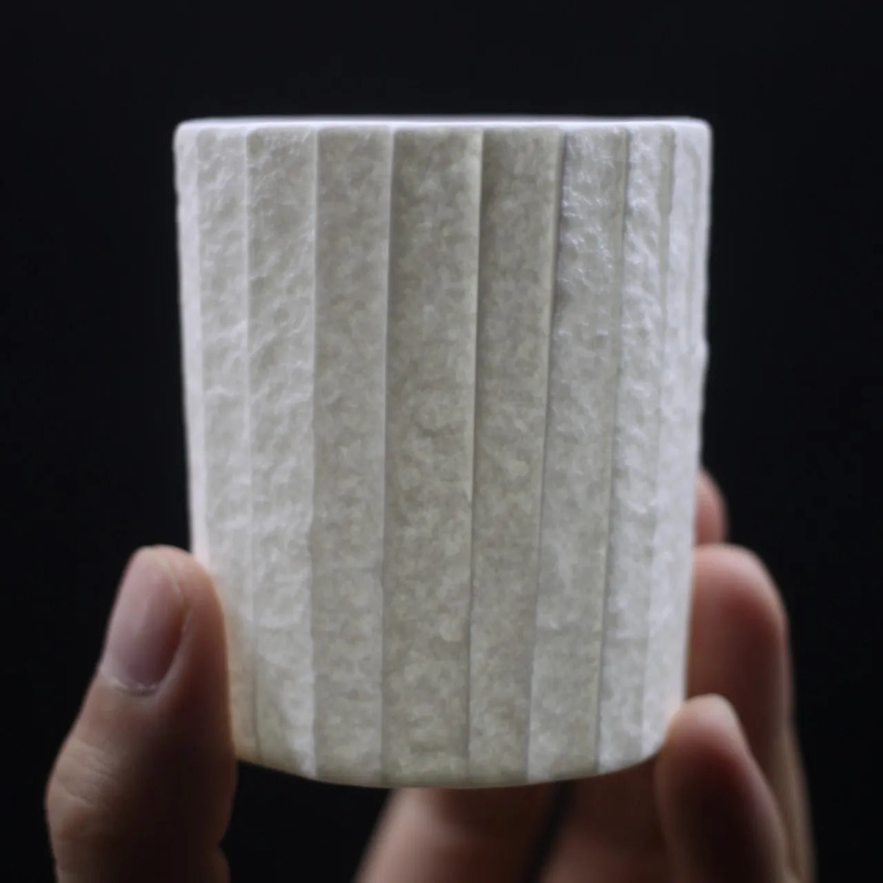 Kilnora Lumora Stonefold Series 180 ml porcelain cup featuring handcrafted rock-fold textures and soft translucence.