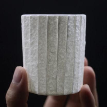 Kilnora Lumora Stonefold Series 180 ml porcelain cup featuring handcrafted rock-fold textures and soft translucence.