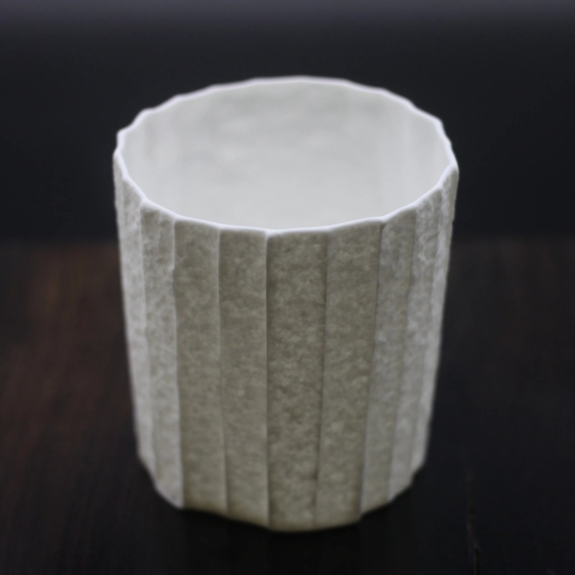 Kilnora Lumora Stonefold Series 220 ml porcelain cup featuring handcrafted rock-fold textures and soft translucence.