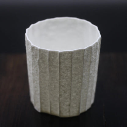 Kilnora Lumora Stonefold Series 220 ml porcelain cup featuring handcrafted rock-fold textures and soft translucence.