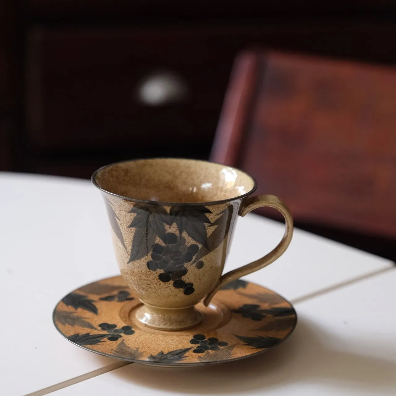 Kilnora Shisō cup and saucer set with blue-and-white grape Chyongku porcelain design