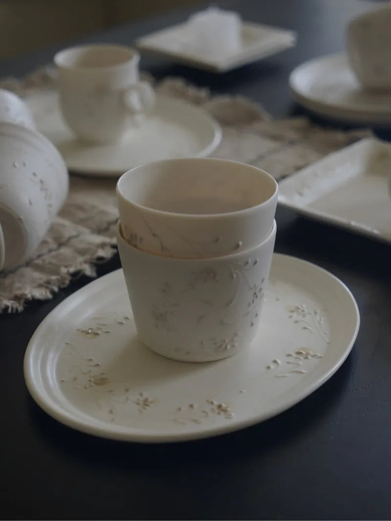 Kilnora Sōng Amber Series ceramic Chyongku cup with warm amber glaze and hand-painted slip motifs
