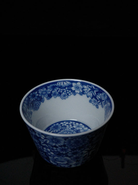 Kilnora Blue-and-White Myriad Flowers porcelain coffee cup featuring intricate floral pattern