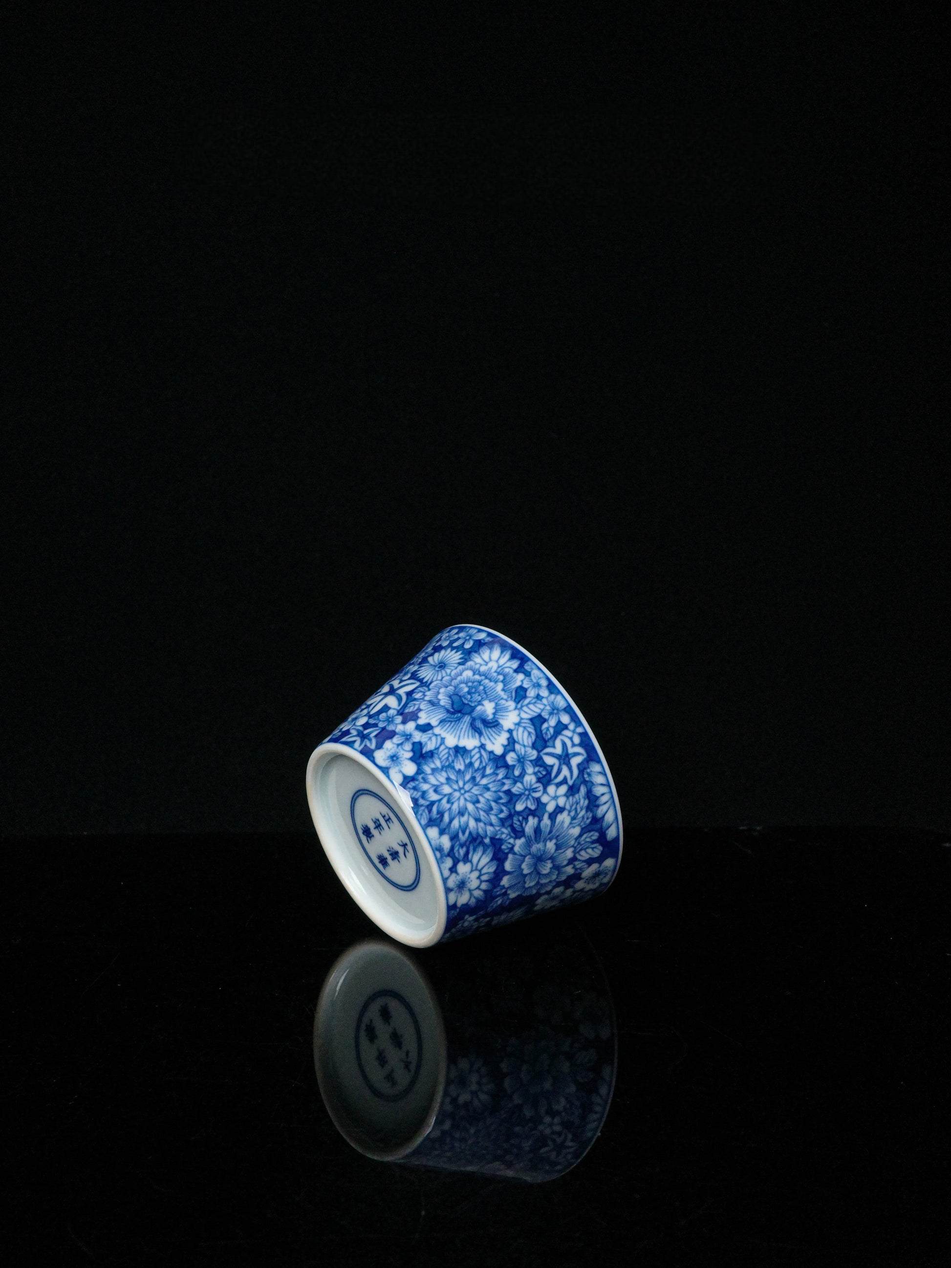 Kilnora Blue-and-White Myriad Flowers porcelain coffee cup featuring intricate floral pattern