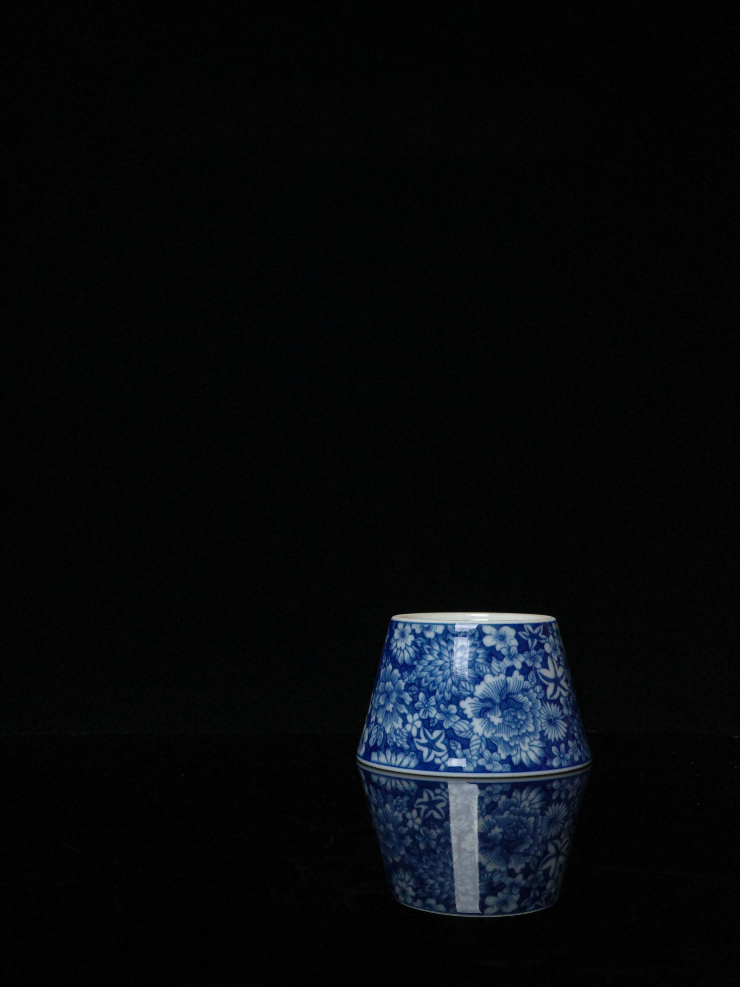 Kilnora Blue-and-White Myriad Flowers porcelain coffee cup featuring intricate floral pattern