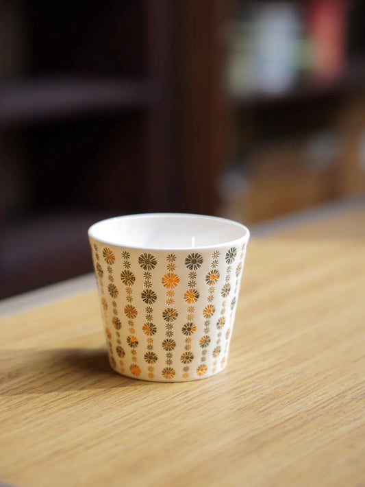 Kilnora LOOFA STUDIO Apricot Hue carved daisy porcelain cup with gentle apricot glaze