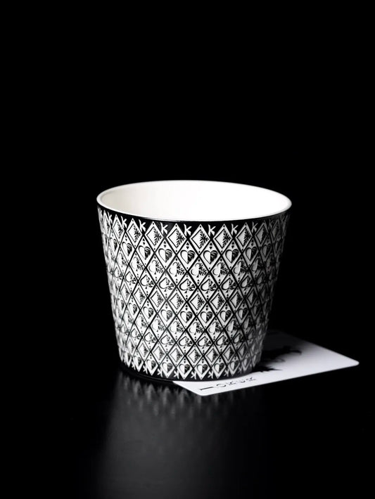 Kilnora LOOFA STUDIO The Magician underglaze carved porcelain cup with playing card motif