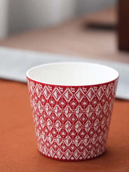 Kilnora LOOFA STUDIO Queen of Fortune underglaze carved porcelain cup with playing card motif