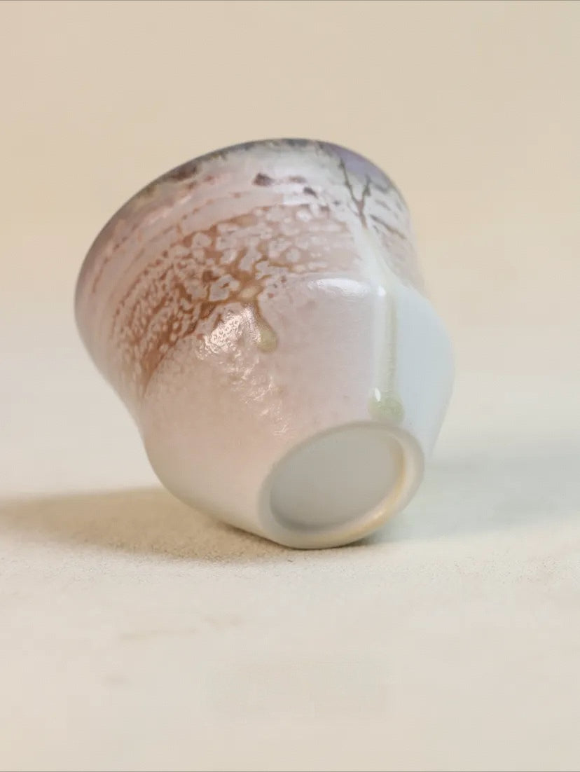 Kilnora Chihiro Series wood-fired porcelain cup with gentle curves and flame-kissed finish.