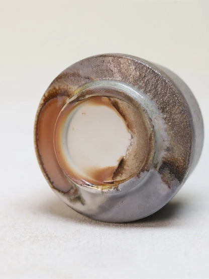 Kilnora Chihiro Series charcoal bare cup wood-fired for deep graphite tones and raw texture.