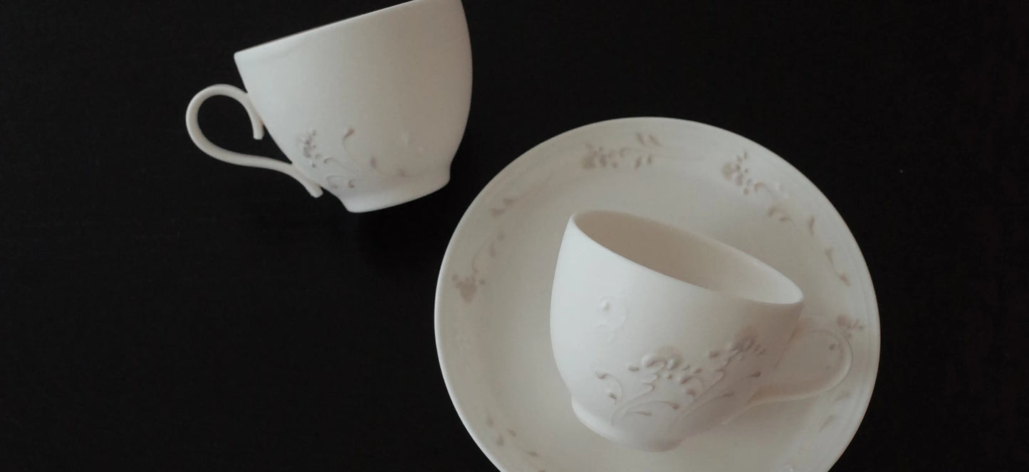 Kilnora Sōng Dandelion Series matte white coffee cup with handcrafted slip patterns and subtle glaze variations