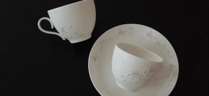 Kilnora Sōng Dandelion Series matte white coffee cup with handcrafted slip patterns and subtle glaze variations