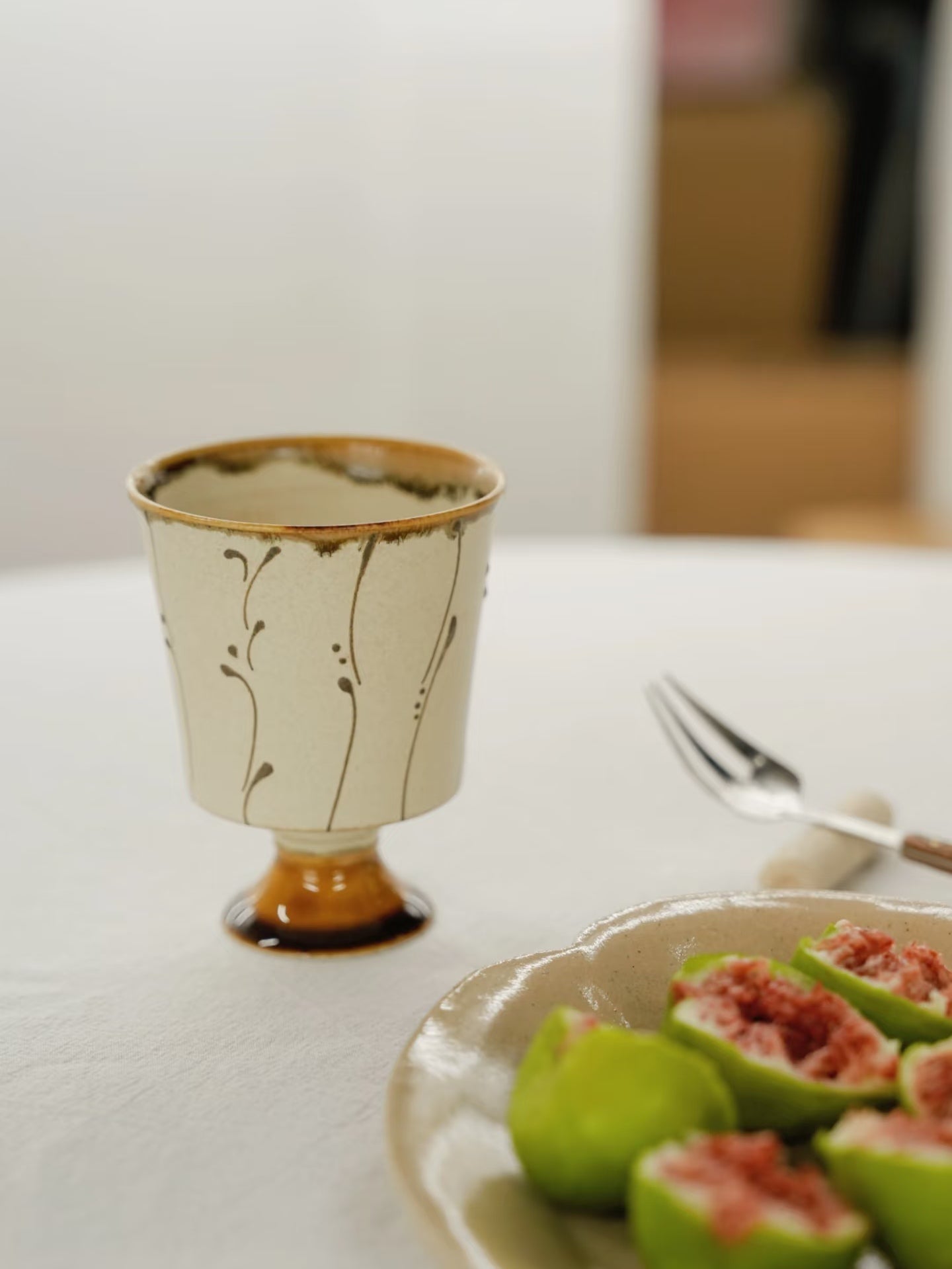 Kilnora Sōng Amber Series stemmed goblet with translucent amber glaze and elegant silhouette