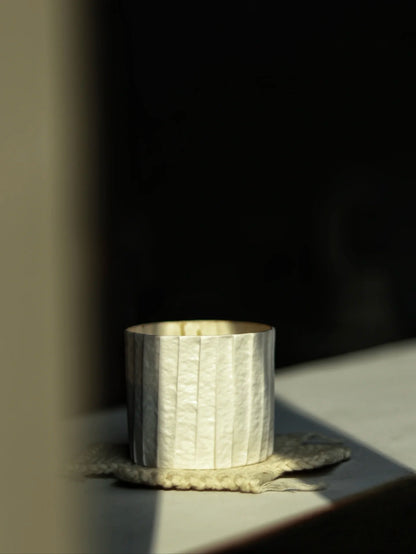 Kilnora Lumora Stonefold Series 180 ml porcelain cup featuring handcrafted rock-fold textures and soft translucence.