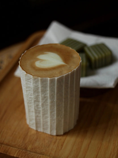 Kilnora Lumora Stonefold Series 200 ml porcelain cup featuring handcrafted rock-fold textures and soft translucence.