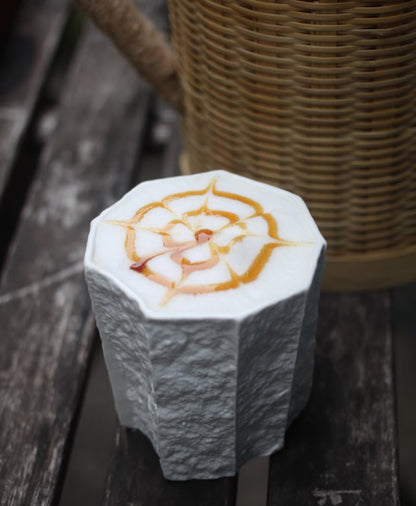 Kilnora Lumora Sekisen Series 250 ml porcelain cup with folded stone-inspired form and translucent paper-thin walls.