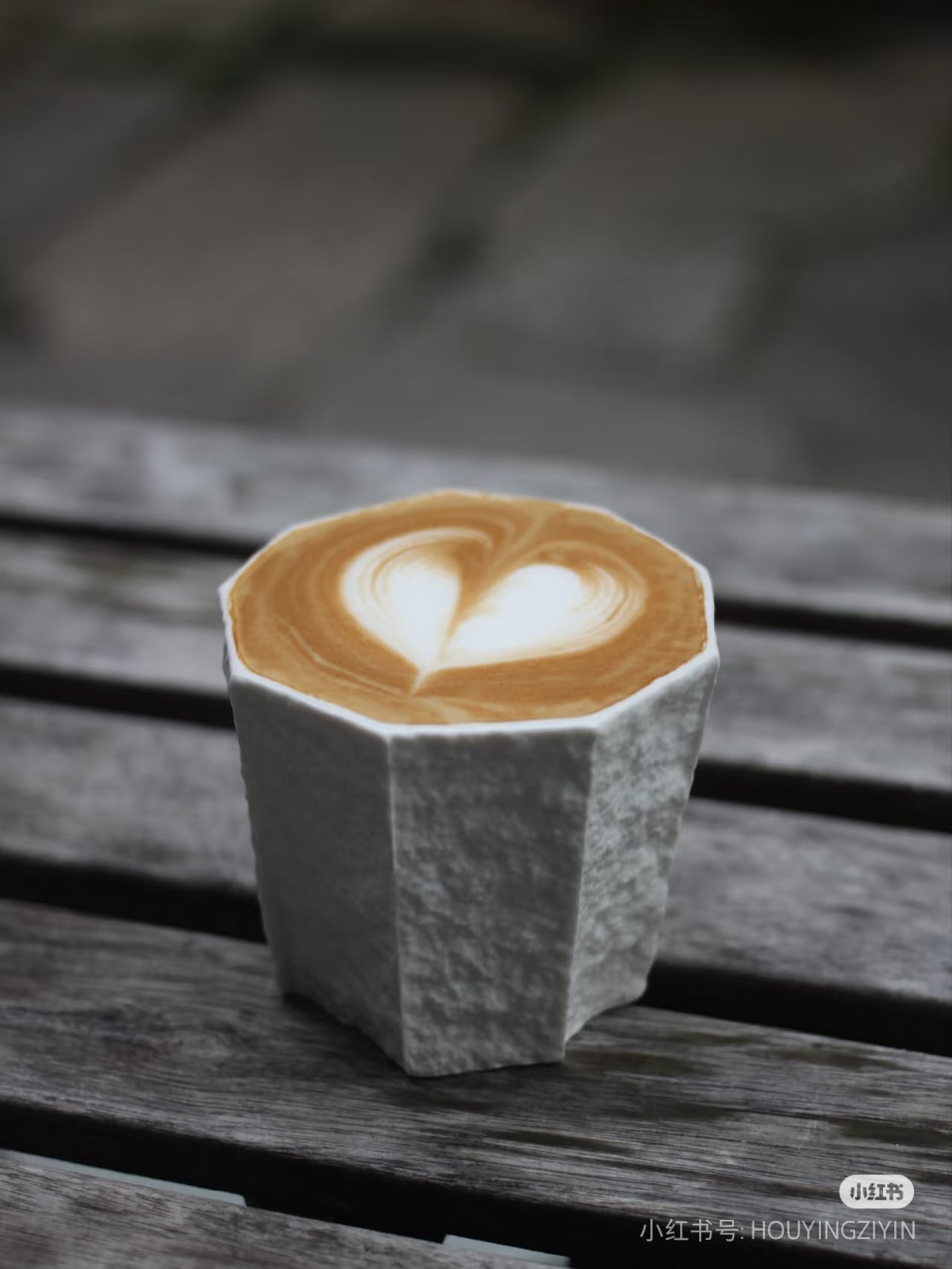 Kilnora Lumora Sekisen Series 180 ml porcelain cup with folded stone-inspired form and translucent paper-thin walls.