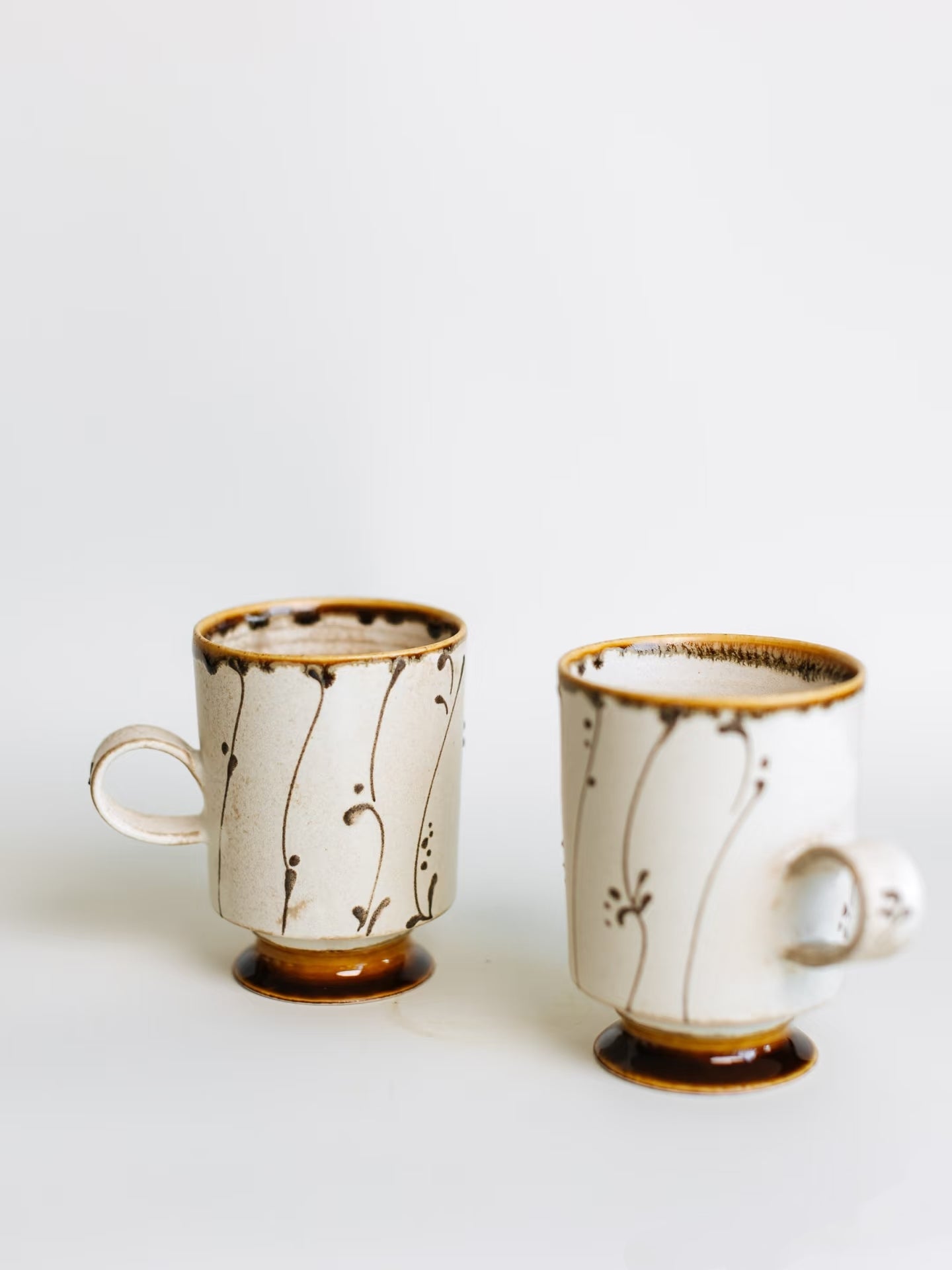 Kilnora Sōng Amber Series coffee cup featuring rich amber glaze and delicate relief patterns
