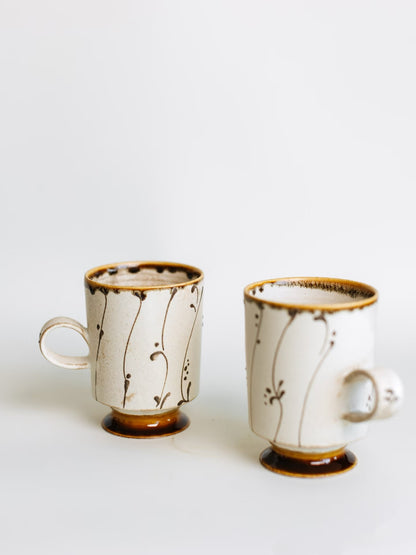 Kilnora Sōng Amber Series coffee cup featuring rich amber glaze and delicate relief patterns