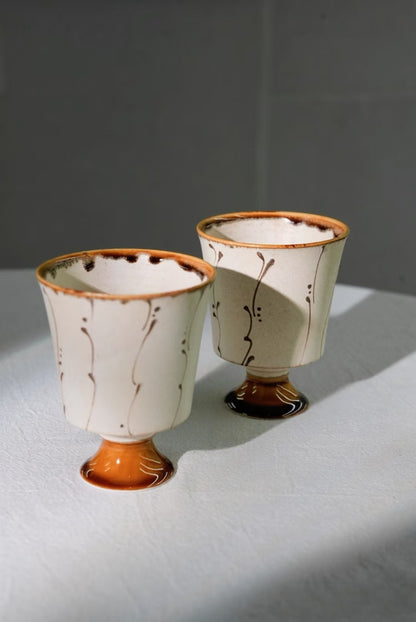 Kilnora Sōng Amber Series stemmed goblet with translucent amber glaze and elegant silhouette