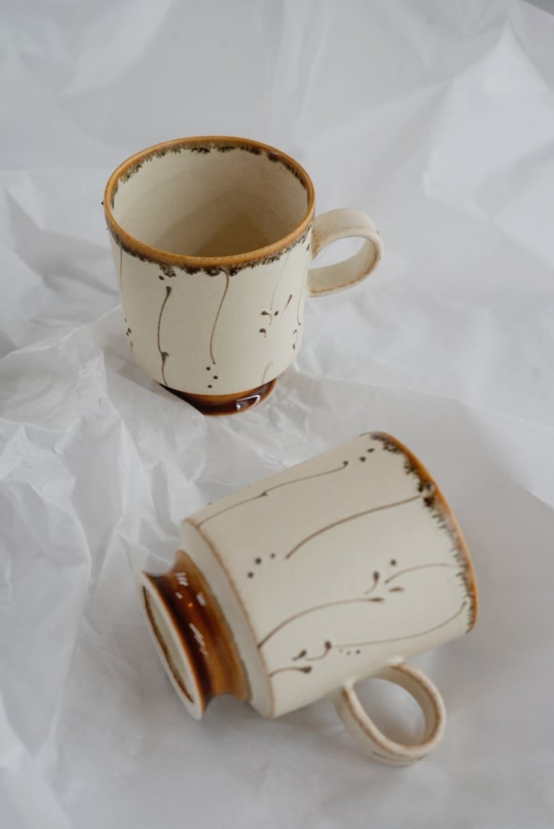 Kilnora Sōng Amber Series coffee cup featuring rich amber glaze and delicate relief patterns