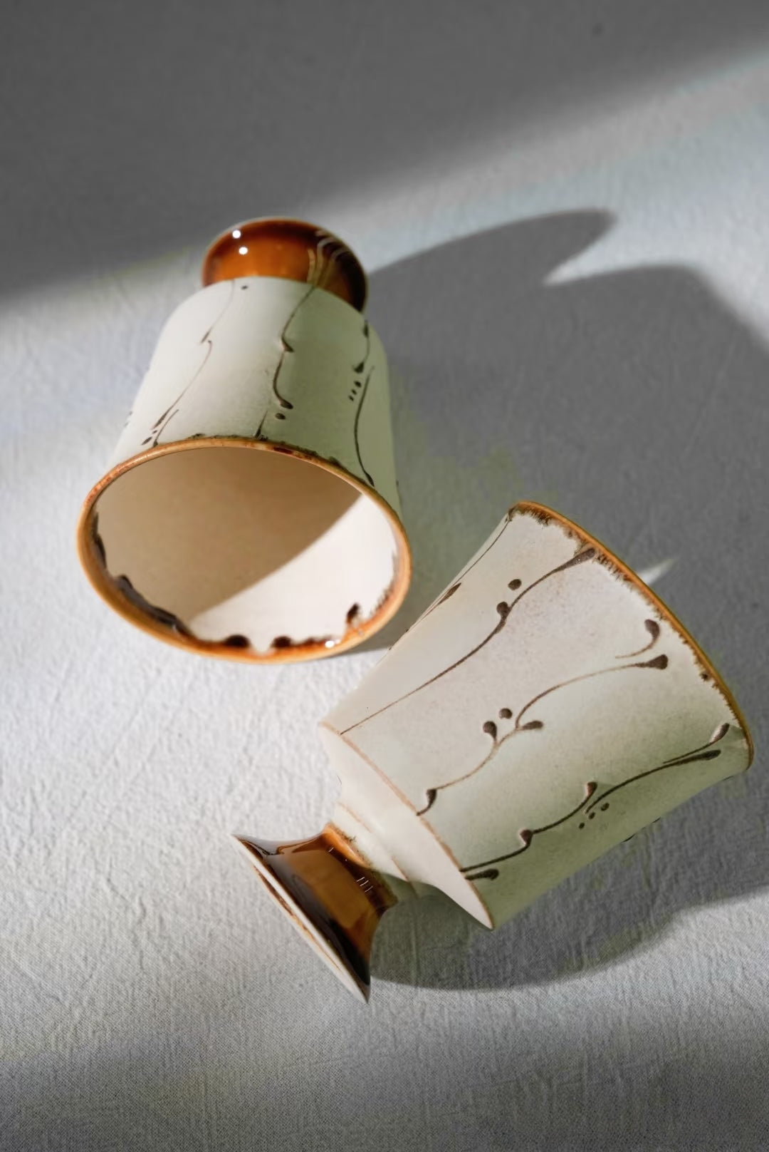 Kilnora Sōng Amber Series stemmed goblet with translucent amber glaze and elegant silhouette