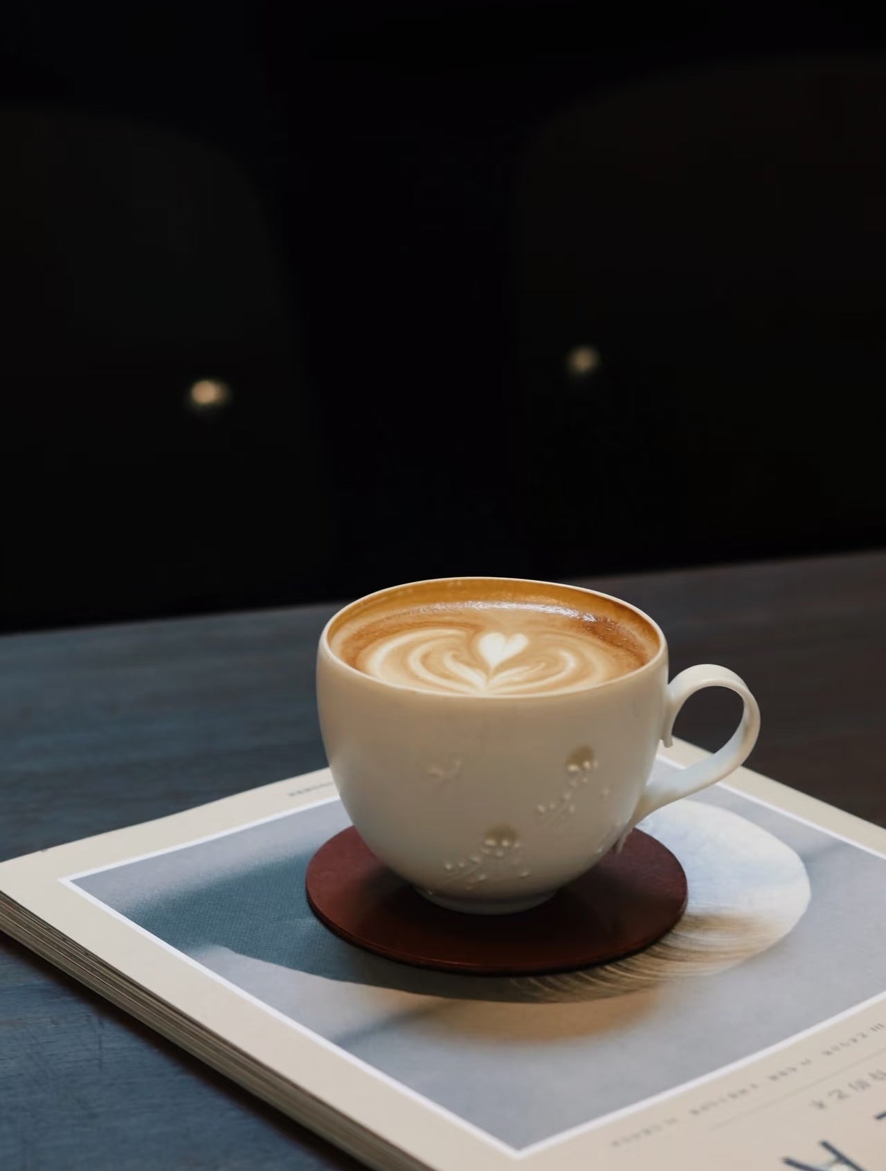 Kilnora Sōng Dandelion Series matte white coffee cup with handcrafted slip patterns and subtle glaze variations