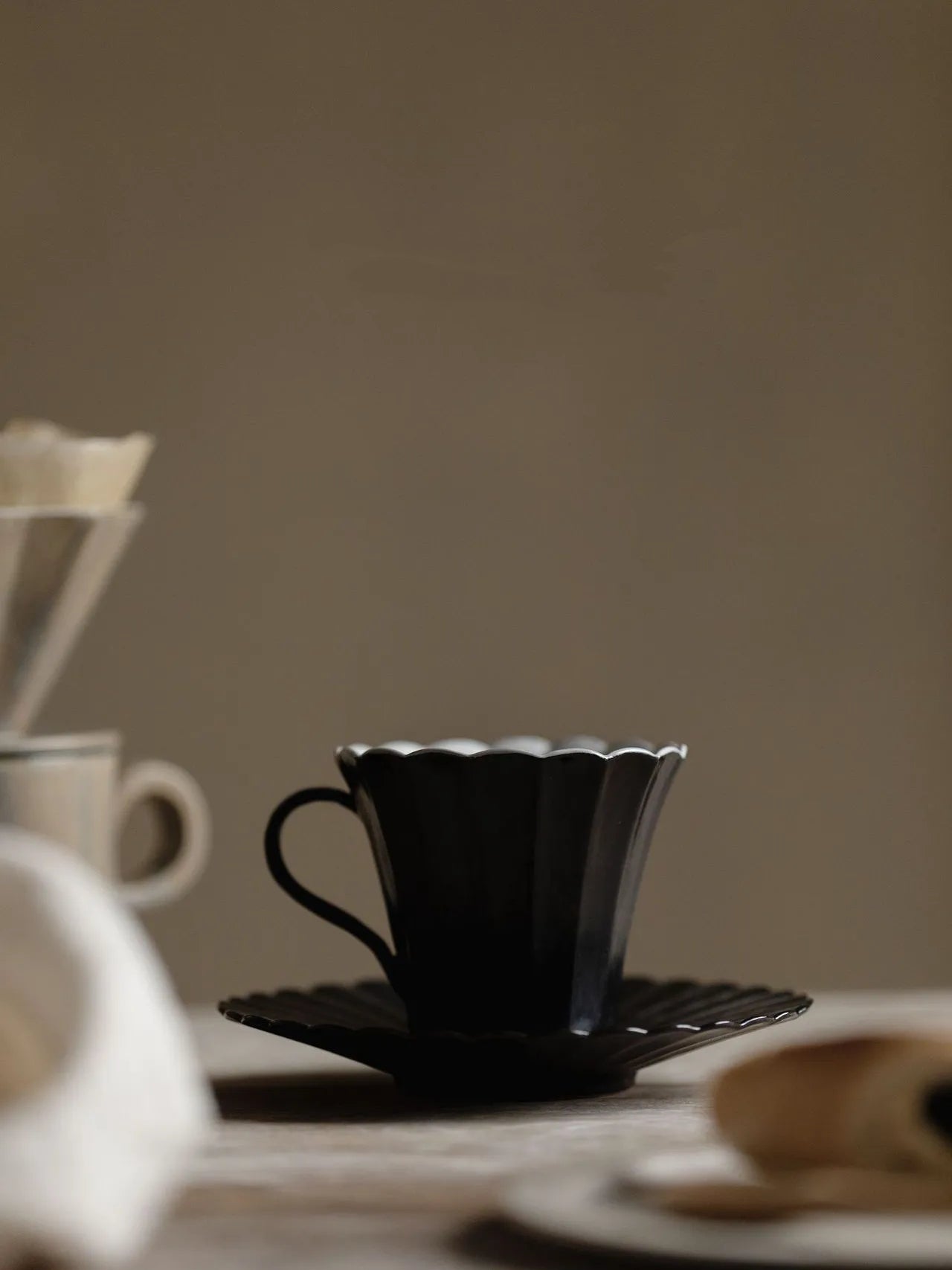 Kilnora Venor Wabi-Sabi black porcelain cup and saucer set with matte black glaze and aged finish