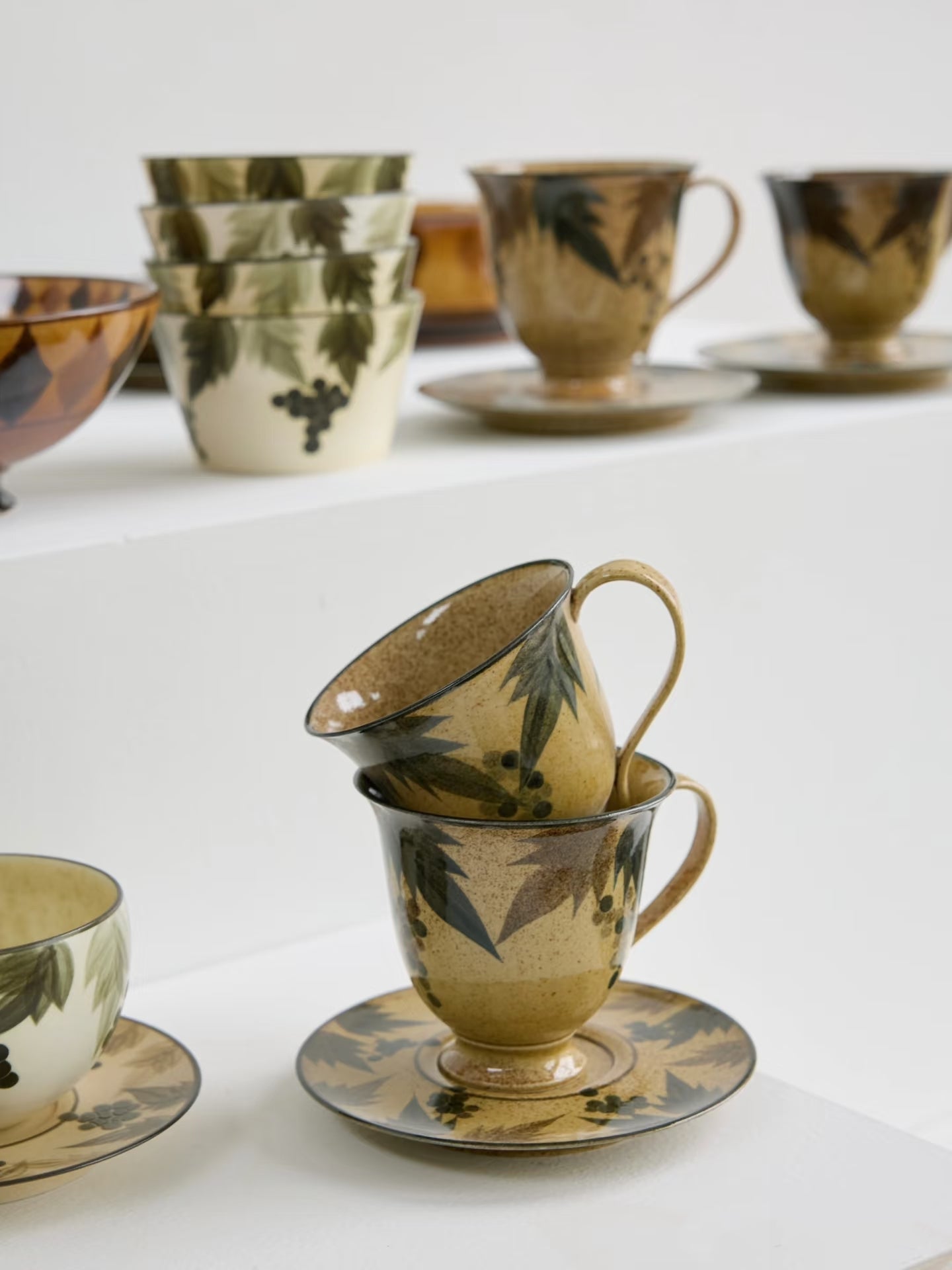 Kilnora Shisō cup and saucer set with blue-and-white grape Chyongku porcelain design