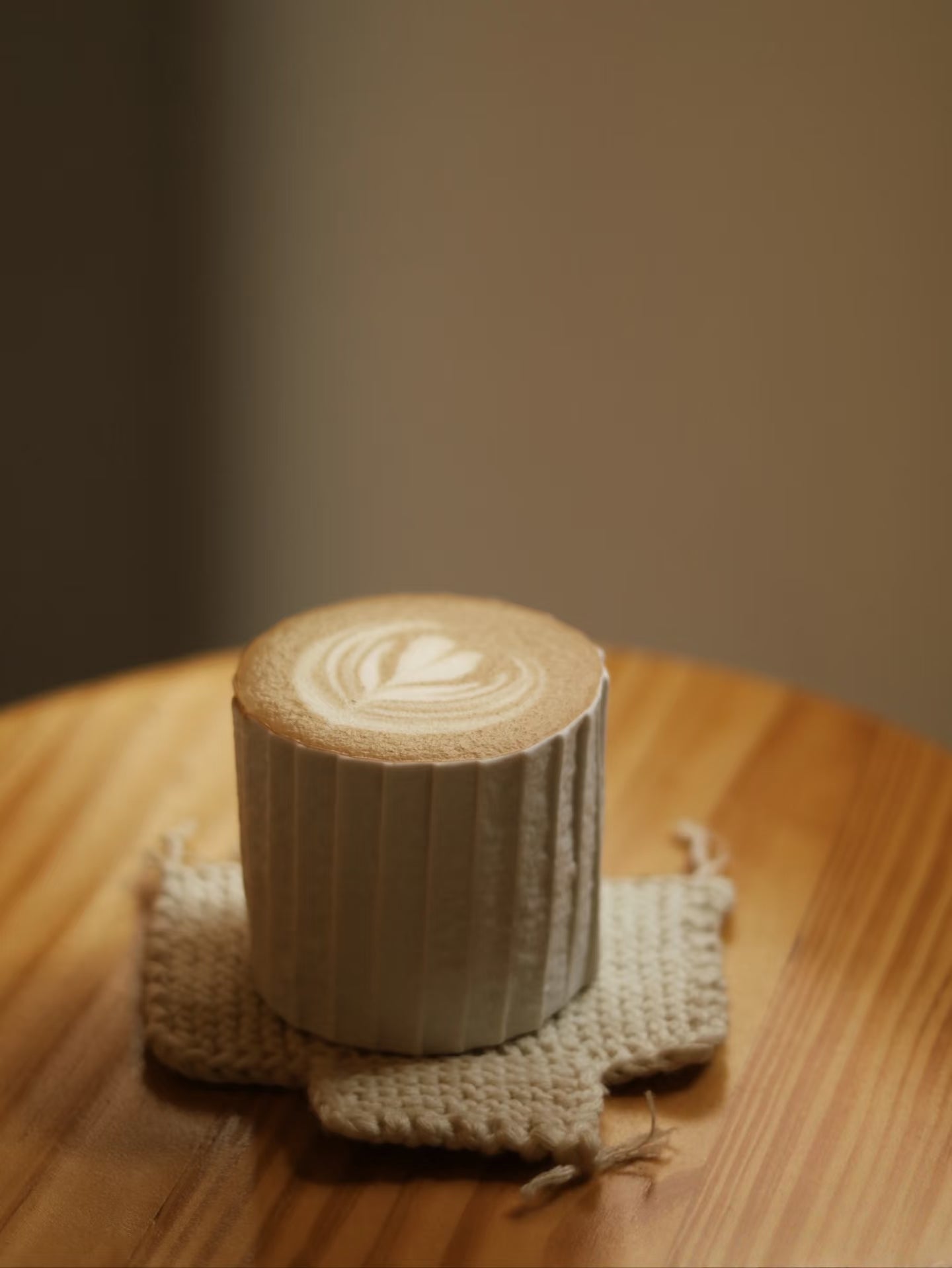 Kilnora Lumora Stonefold Series 220 ml porcelain cup featuring handcrafted rock-fold textures and soft translucence.