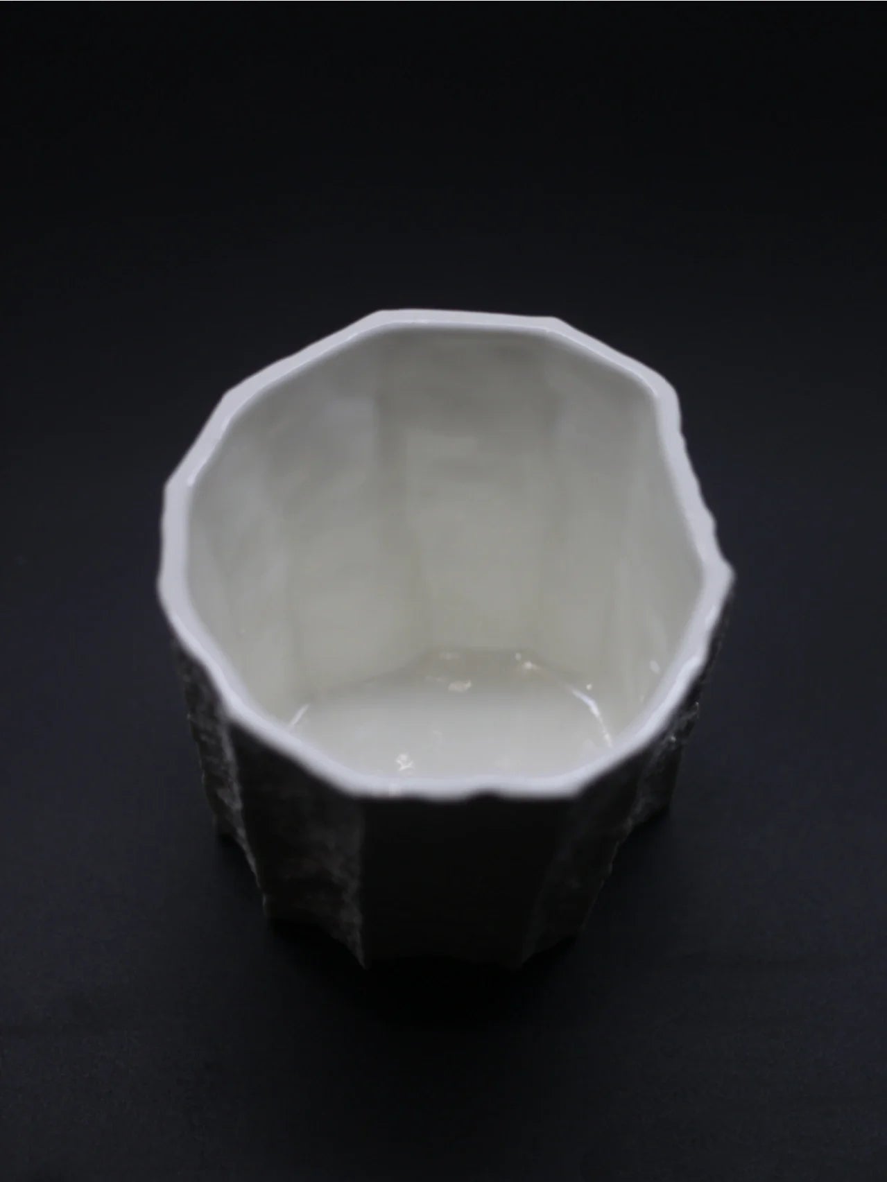Kilnora Lumora Sekisen Series 250 ml porcelain cup with folded stone-inspired form and translucent paper-thin walls.