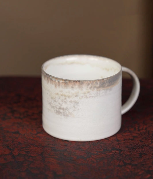 Kilnora Dai-in Series high-white clay wood-fired mug showcasing pure porcelain translucence.