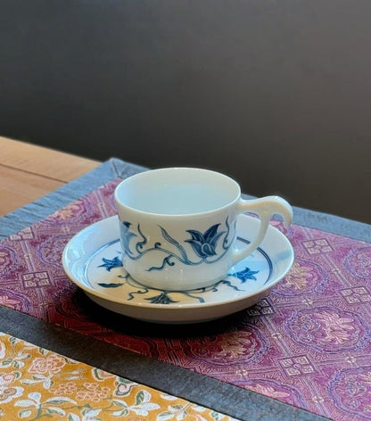 Kilnora Blue-and-White Myriad Flowers porcelain coffee cup featuring intricate floral pattern
