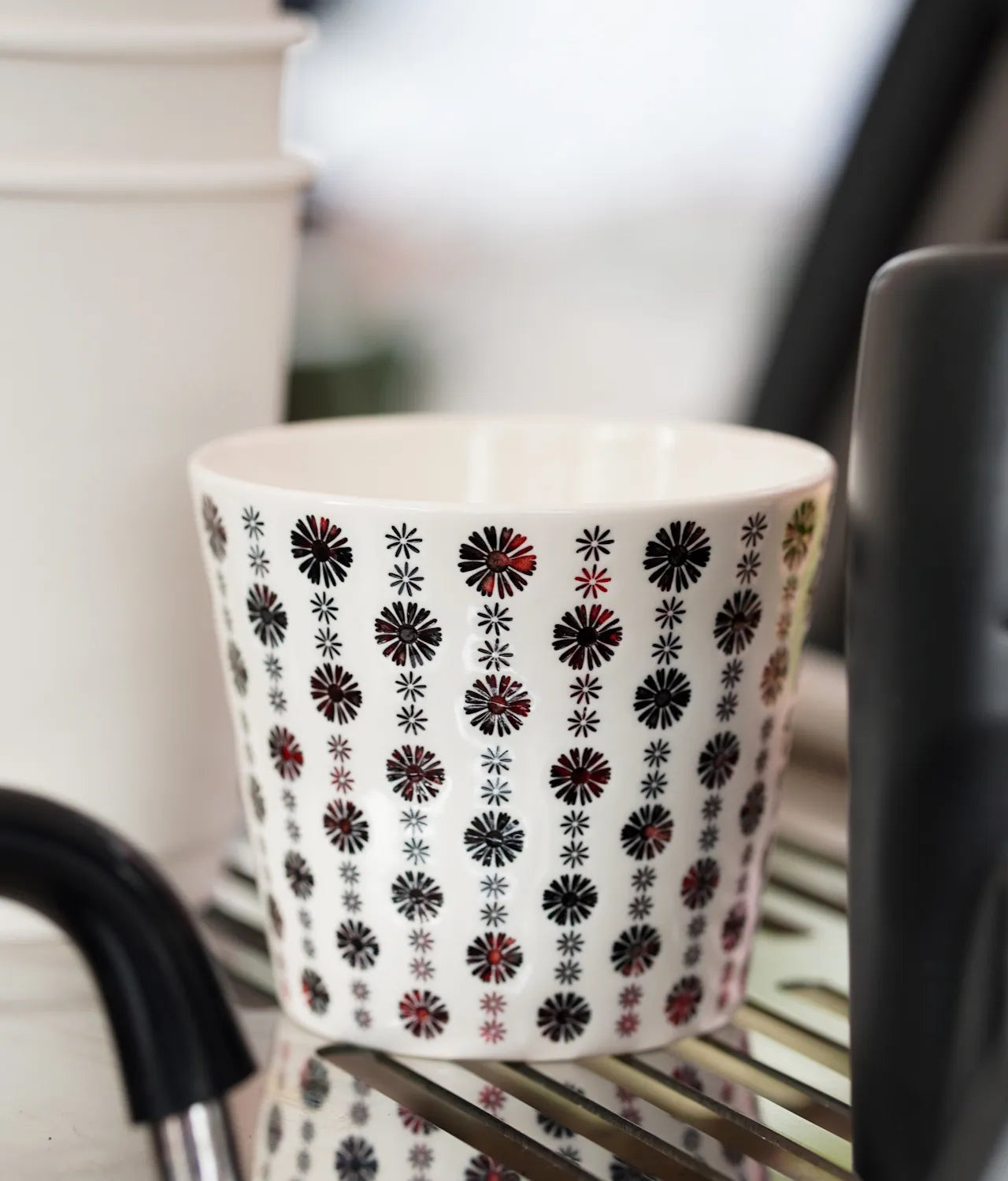 Kilnora LOOFA STUDIO Cranberry underglaze carved daisy porcelain cup in rich cranberry hue