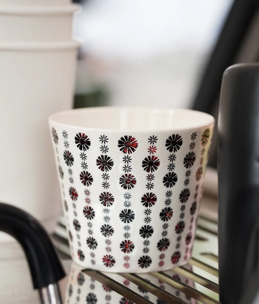 Kilnora LOOFA STUDIO Cranberry underglaze carved daisy porcelain cup in rich cranberry hue